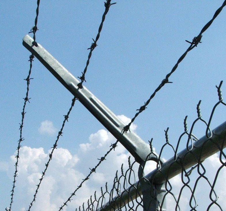Barbed wire post extension