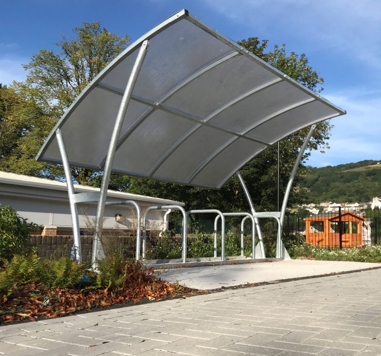 cycle shelter with large tilted canopy roof